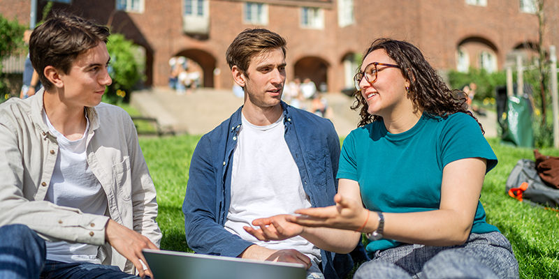 Three students at the courtyard